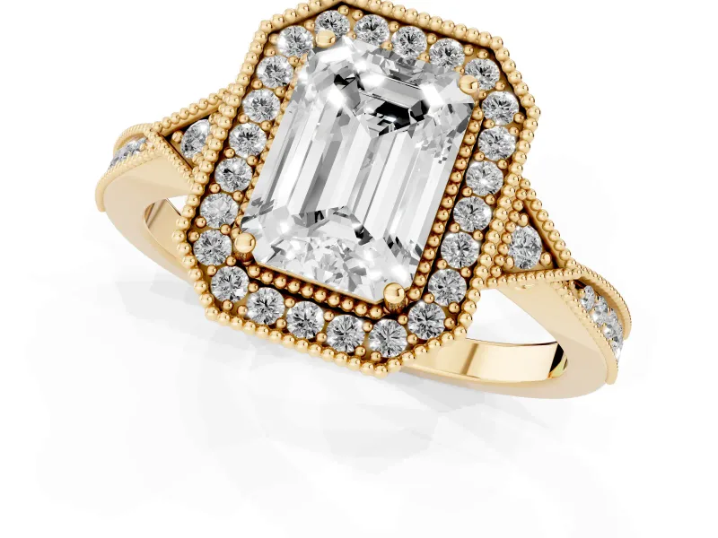 Emerald Cut Diamond Halo Engagement Ring Set in Yellow gold with Milgrain Pavé Band