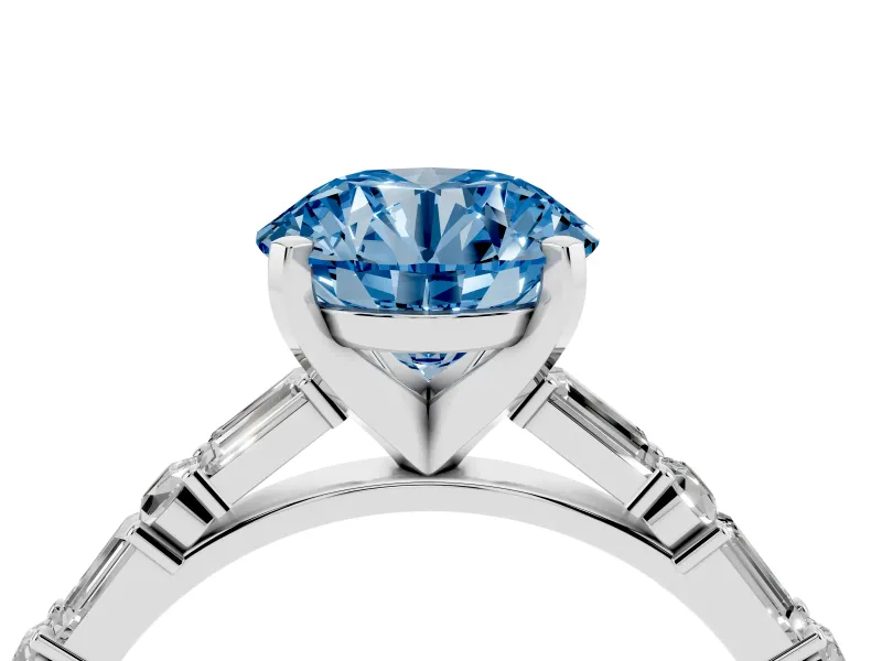 Fancy Blue Round Cut Diamond Solitaire Set in Silver with Side Baguettes and Channel Set Band