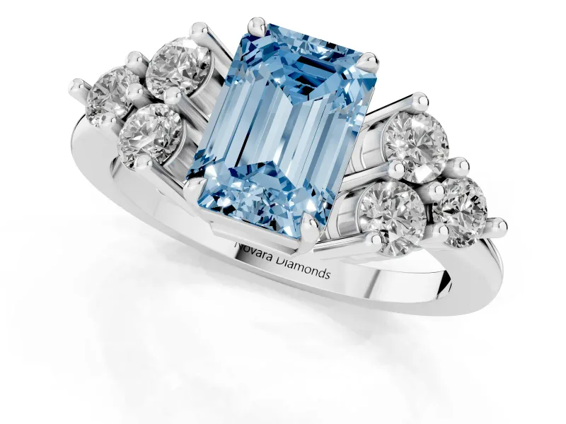 Fancy Blue Emerald Cut Diamond Solitaire Ring Set in Platinum with Cluster Accents on Each Side