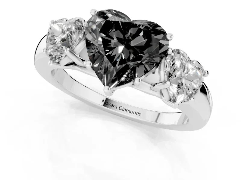 Fancy Black Heart Cut Diamond Three-Stone Ring Set in White gold with Bold Center and Classic Band