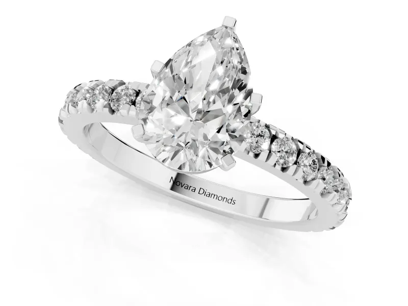 Pear Cut Diamond Pavé Band Solitaire Set in White gold with Prong Setting