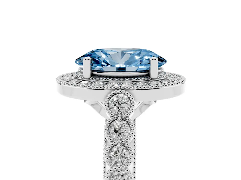 Fancy Blue Oval Cut Diamond Milgrain Halo Solitaire Ring Set in Platinum with Bezel Set Side Stones and Pavé Band