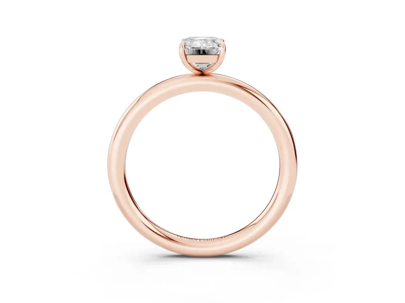 Emerald Cut Diamond Solitaire Ring Set in Rose gold with Prong Setting on a Polished Plain Band