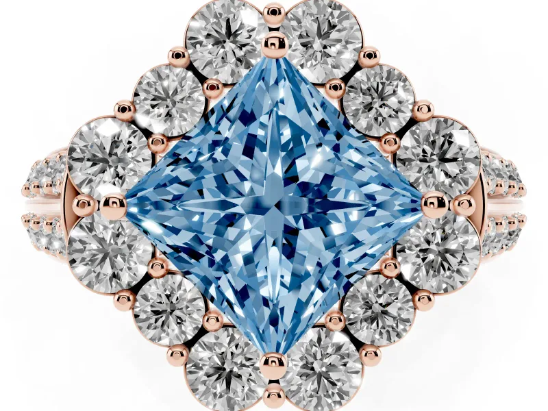Fancy Blue Princess Cut Diamond Halo Engagement Ring Set in Rose gold with Split Shank and Prong Setting