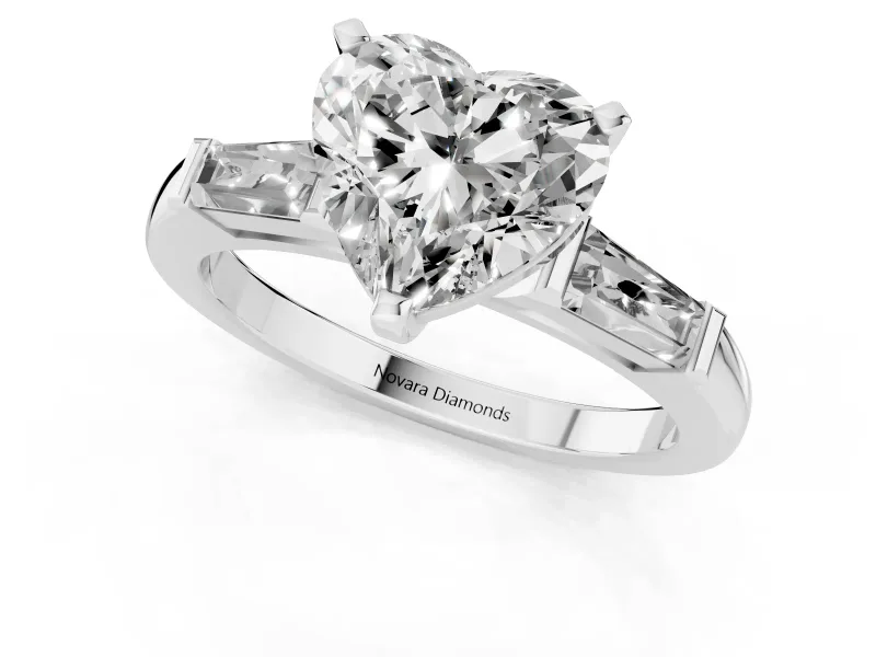 Heart Cut Diamond Solitaire Ring Set in Silver with Tapered Baguette Side Stones and Prong Setting