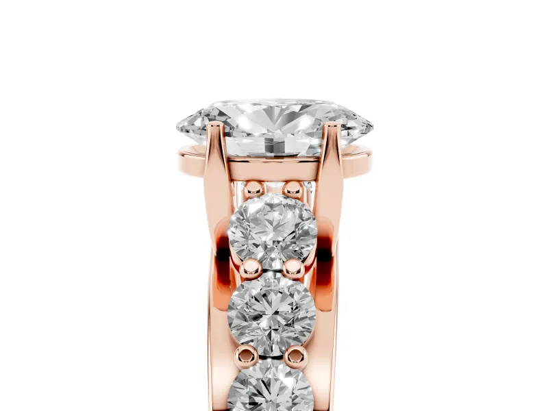 Oval Graduated Side Stone Engagement Ring Setting | Shared Prong Rails | Rose Gold