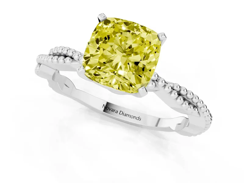 Fancy Yellow Cushion Cut Diamond Solitaire Ring Set in White gold with Twisted Band and Bead Prong Setting