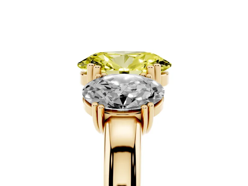 Fancy Yellow Oval Cut Diamond Three-Stone Ring Set in Yellow gold with Polished Band and Prong Setting