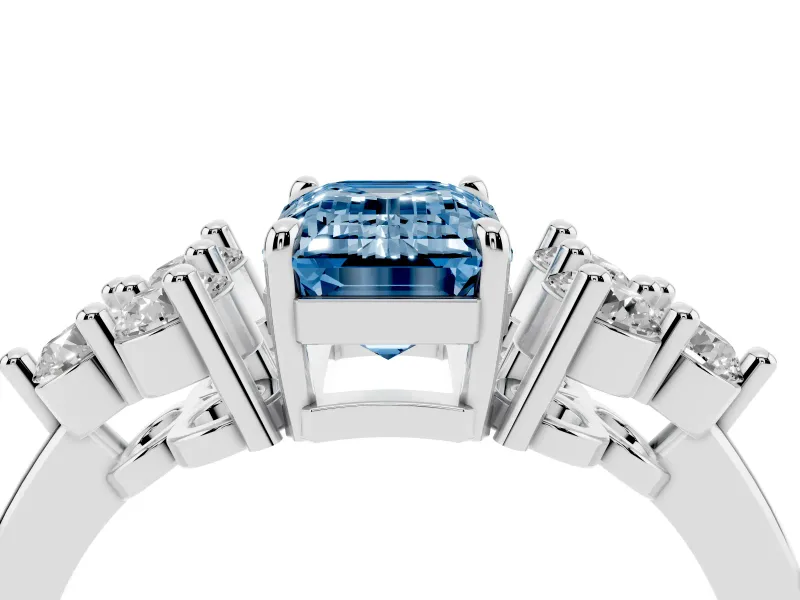 Fancy Blue Emerald Cut Diamond Solitaire Ring Set in White gold with Cluster Accents on Each Side