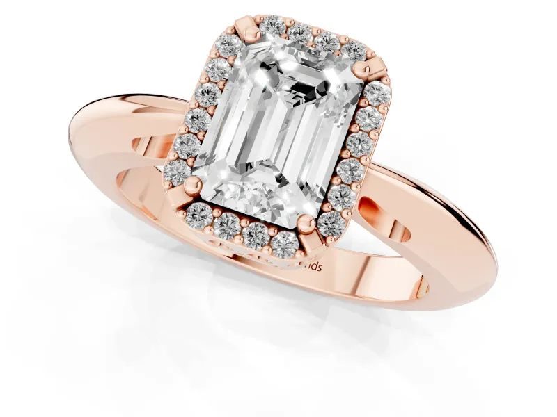 Emerald Cut Diamond Halo Engagement Ring Set in Rose gold with Plain Split Shank and Prong Setting