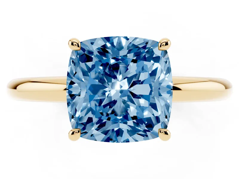Fancy Blue Cushion Cut Diamond Solitaire Ring Set in Yellow gold with Thin Band and Prong Setting