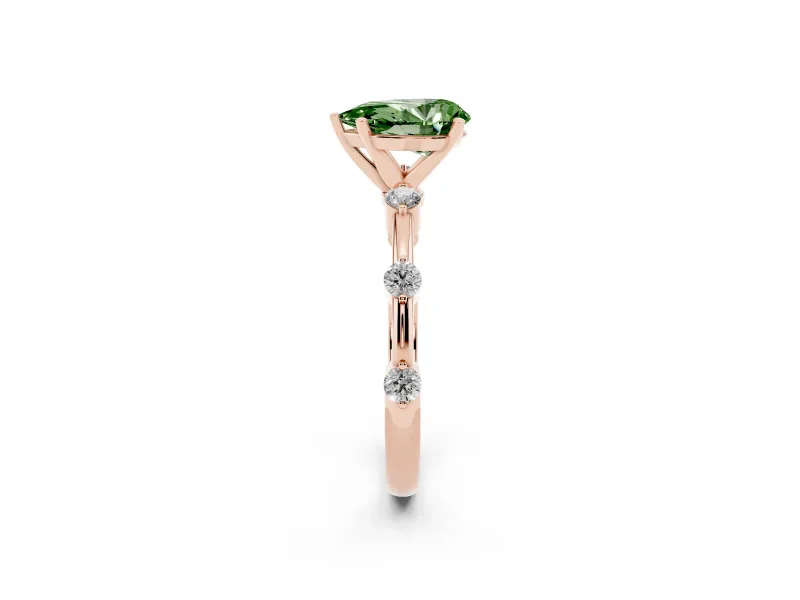 Fancy Green Pear Cut Diamond Solitaire Ring Set in Rose gold with Bezel Set Side Stones and Prong Setting