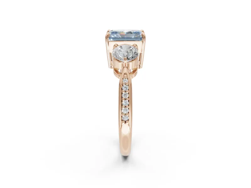 Radiant Cut Three Stone Engagement Ring Setting for a Fancy Blue Lab-Grown Diamond | Tapered Pave Band | Rose Gold