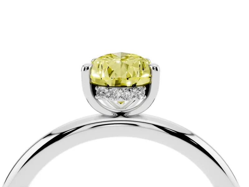 Fancy Yellow Pear Cut Diamond Solitaire Ring Set in White gold with Thin Band and Prong Setting
