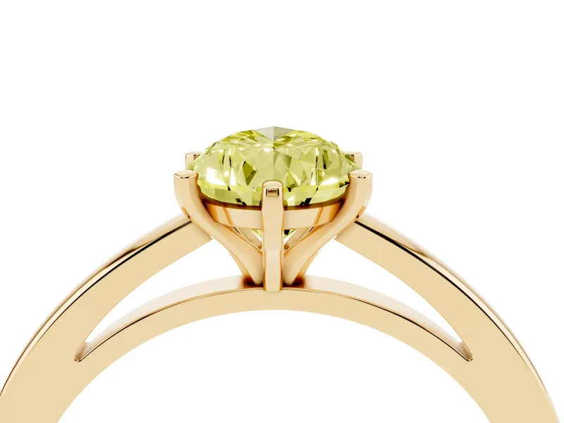 Fancy Yellow Pear Cut Diamond Solitaire Engagement Ring Set in Yellow gold with Prong Setting on a Classic Band