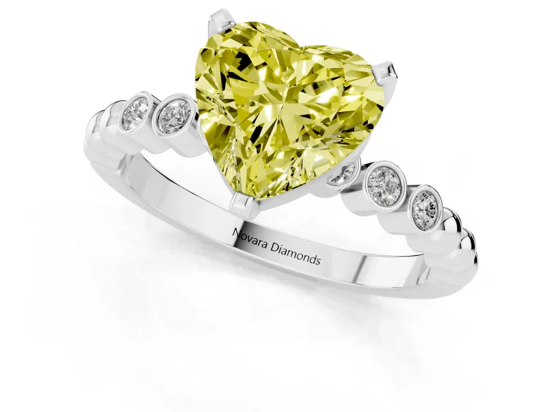 Fancy Yellow Heart Cut Diamond Solitaire Engagement Ring Set in Silver with Bezel Accents on Beaded Band