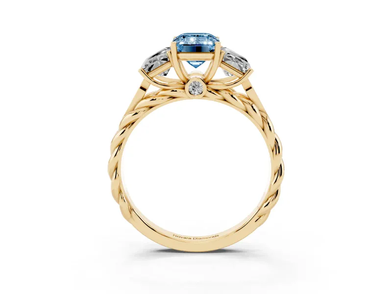 Fancy Blue Emerald Cut Diamond Three-Stone Ring Set in Yellow gold with Braided Band