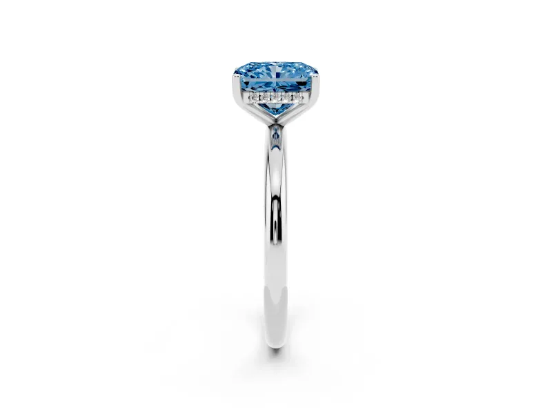 Fancy Blue Radiant Cut Diamond Solitaire Engagement Ring Set in White gold with Prong Setting and Polished Band