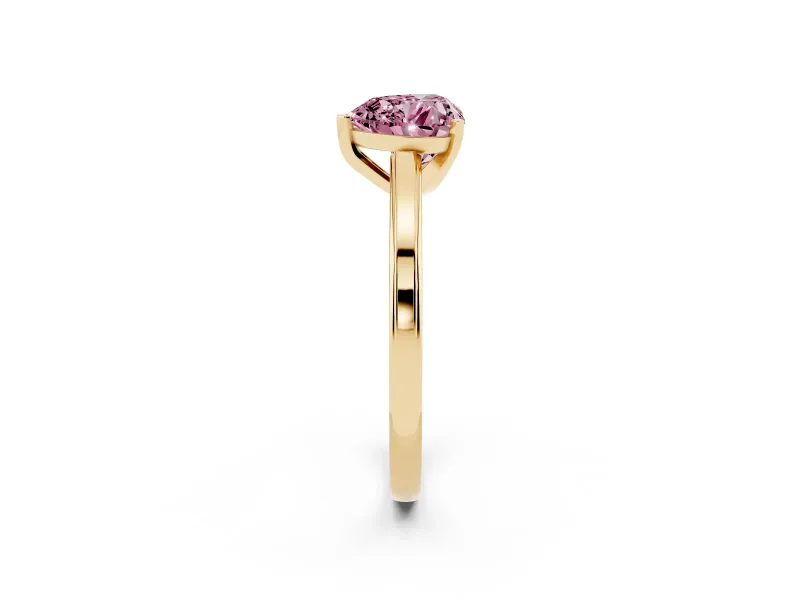Fancy Pink Heart Cut Diamond Solitaire Ring Set in Yellow gold with Prong Setting and Classic Band