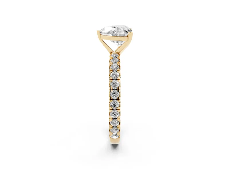 Heart Cut Diamond Pavé Solitaire Ring Set in Yellow gold with Round Band and Prong Setting