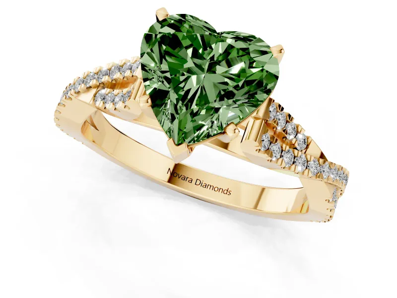 Fancy Green Heart Cut Diamond Solitaire Engagement Ring Set in Yellow gold with Twisted Pavé Band and Prong Setting