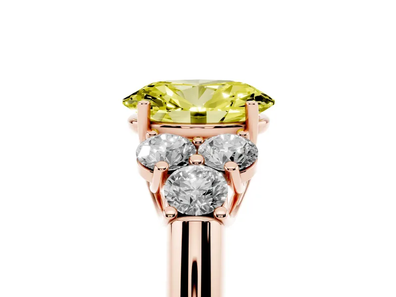 Fancy Yellow Oval Cut Diamond Cluster Ring Set in Rose gold with Round Accent Stones and Prong Setting on a Plain Band