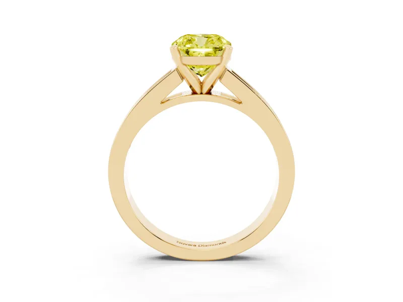 Fancy Yellow Cushion Cut Diamond Solitaire Ring Set in Yellow gold with Channel-Set Band and Prong Setting