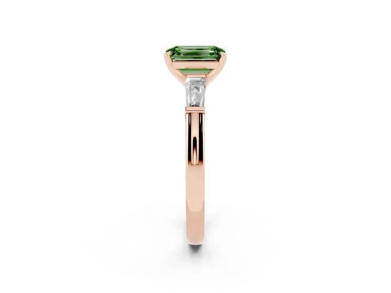 Fancy Green Emerald Cut Diamond Solitaire Ring Set in Rose gold with Tapered Baguette Side Stones and Prong Setting