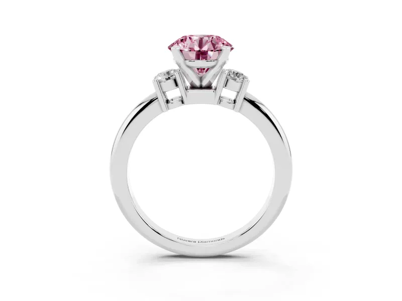 Fancy Pink Three-Stone Round Cut Diamond Ring Set in Platinum with Prong Setting and Plain Band