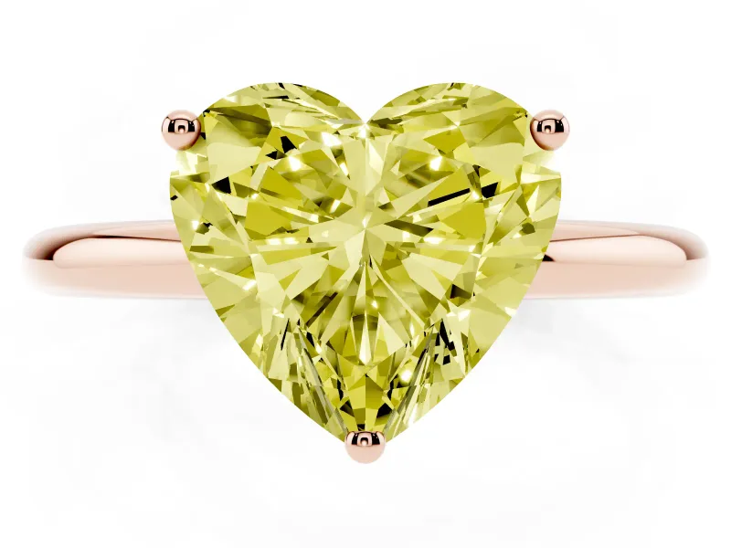 Fancy Yellow Heart Cut Diamond Solitaire Engagement Ring Set in Rose gold with Prong Setting and Polished Band