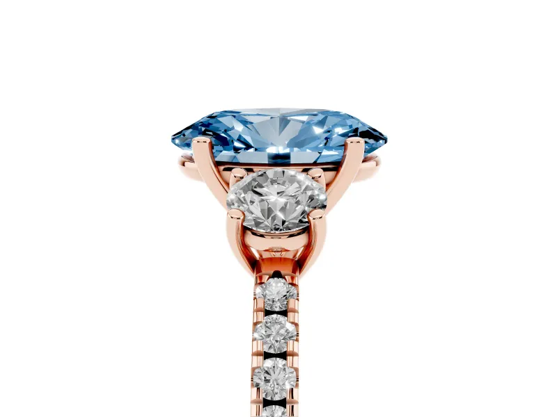 Fancy Blue Oval Cut Diamond Three-Stone Ring Set in Rose gold with Pavé Band and Graduated Sides