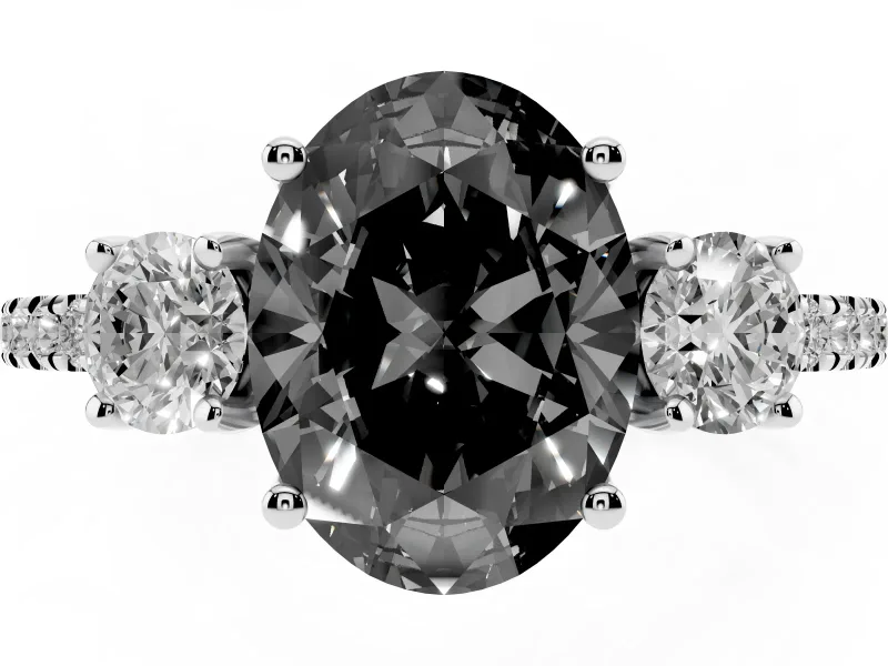 Fancy Black Oval Cut Diamond Three-Stone Ring Set in Platinum with Pavé Band and Graduated Sides