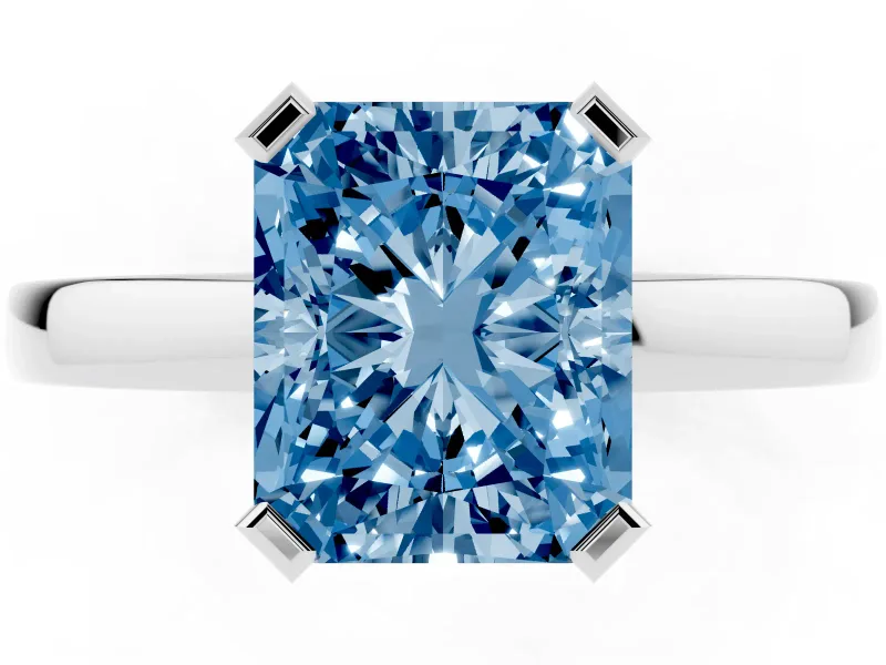 Fancy Blue Radiant Cut Diamond Solitaire Ring Set in Silver with Prong Head and Smooth Polished Band