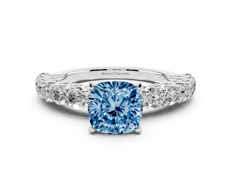 Fancy Blue Cushion Cut Diamond Solitaire Ring Set in White gold with Shared Prong Pavé Band