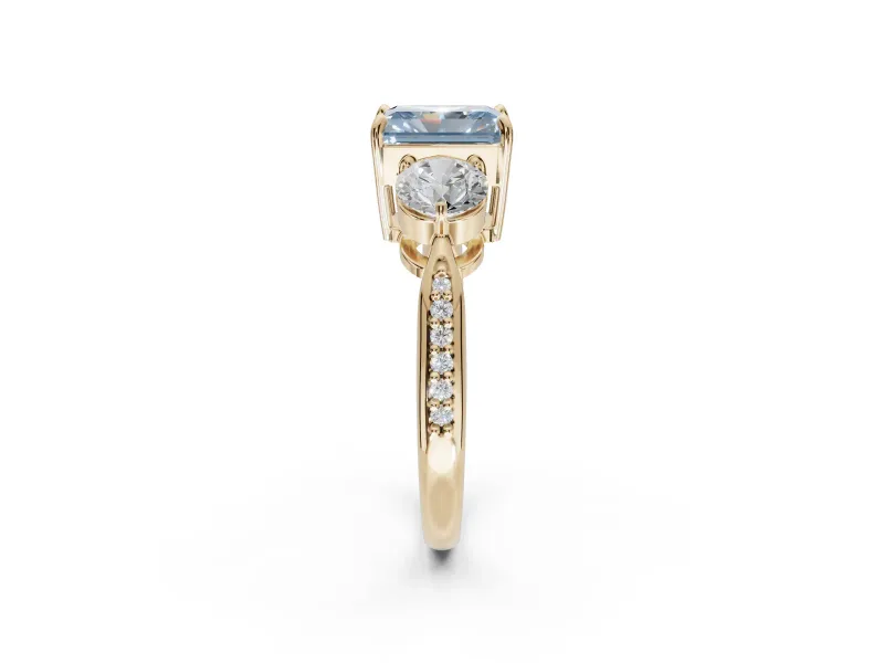 Radiant Cut Three Stone Engagement Ring Setting for a Fancy Blue Lab-Grown Diamond | Tapered Pave Band | Yellow Gold