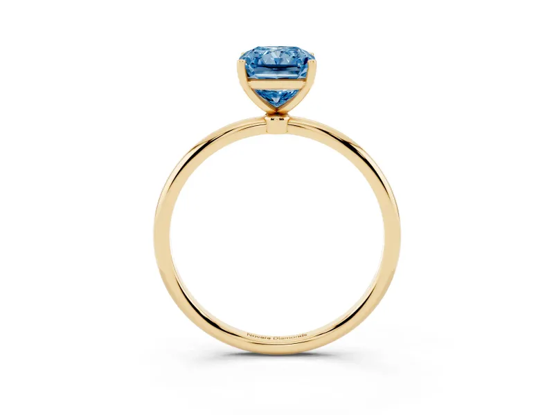 Fancy Blue Radiant Cut Diamond Solitaire Engagement Ring Set in Yellow gold with Thin Band and Prong Setting