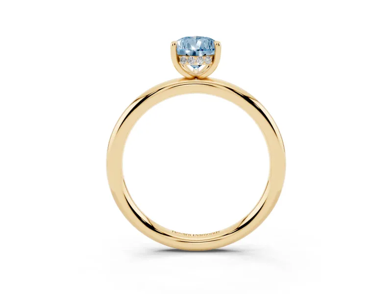 Fancy Blue Pear Cut Diamond Solitaire Ring Set in Yellow gold with Thin Band and Prong Setting