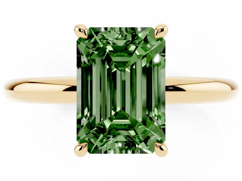 Fancy Green Emerald Cut Diamond Solitaire Ring Set in Yellow gold with Thin Band and Prong Setting