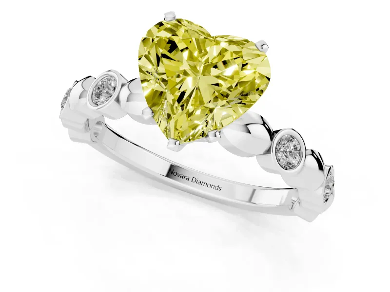 Heart-Shaped Station Engagement Ring Setting for a Fancy Yellow Lab-Grown Diamond | Platinum