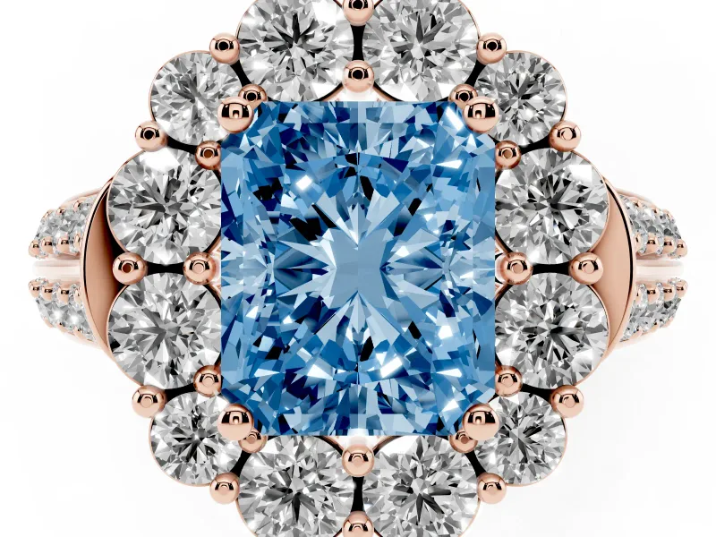 Fancy Blue Radiant Cut Diamond Halo Engagement Ring Set in Rose gold with Split Shank and Prong Setting