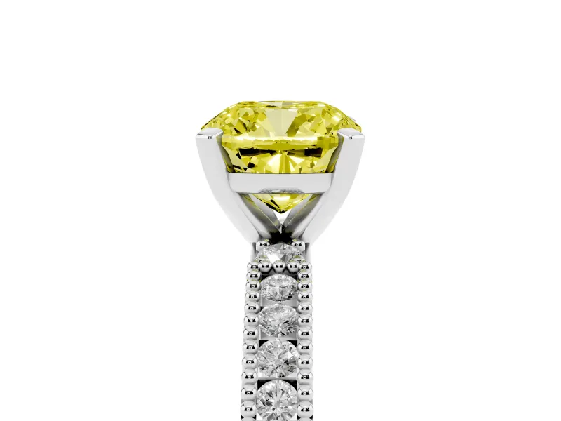 Fancy Yellow Cushion Cut Diamond Solitaire Ring Set in White gold with Slim Pavé Band and Prong Setting
