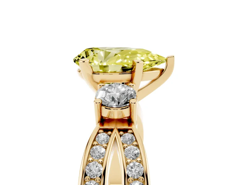 Pear-Shaped Three-Stone Twist Engagement Ring Setting for a Fancy Yellow Lab-Grown Diamond | Yellow Gold