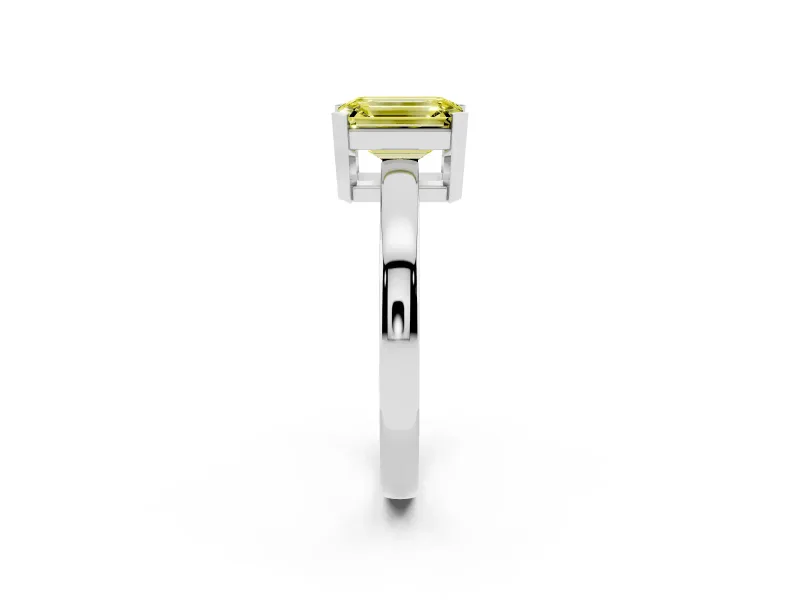Fancy Yellow Emerald Cut Diamond Solitaire Ring Set in Silver with Prong Head and Smooth Polished Band