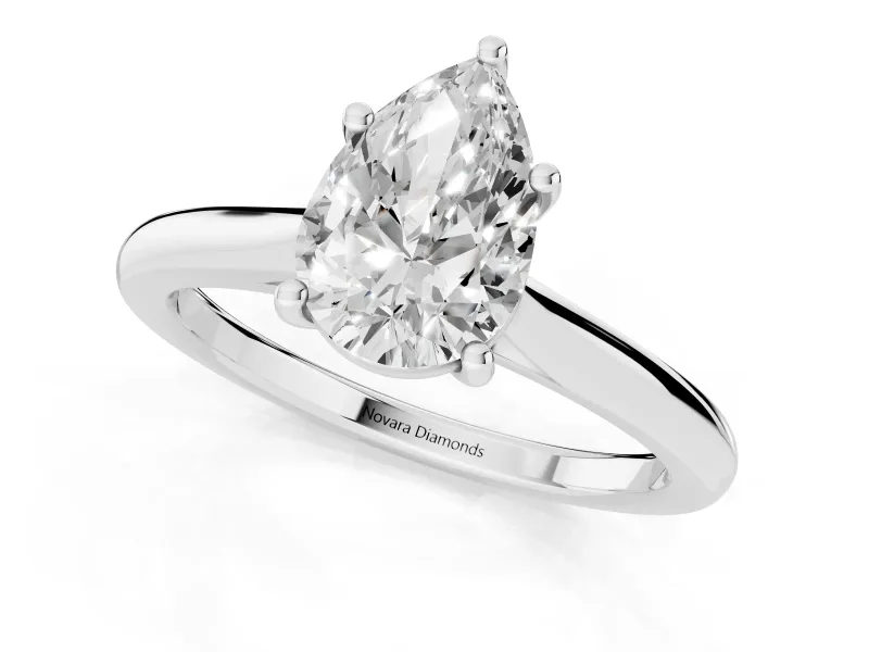 Pear Cut Diamond Solitaire Ring Set in White gold with Cathedral Band and Prong Setting