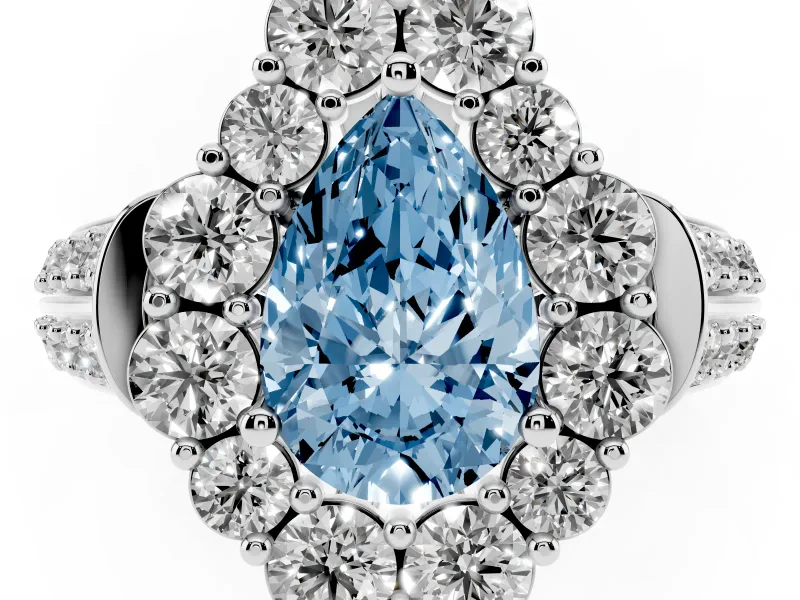 Fancy Blue Pear Cut Diamond Halo Engagement Ring Set in Silver with Split Shank and Prong Setting