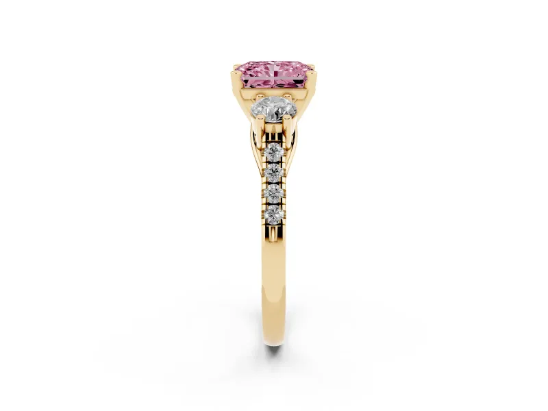 Fancy Pink Three-Stone Radiant Cut Diamond Pavé Band Ring Set in Yellow gold with Prong-Set Trio