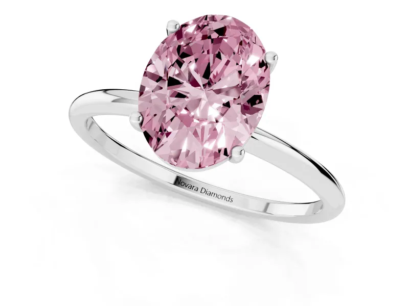 Fancy Pink Oval Cut Diamond Solitaire Engagement Ring Set in Platinum with Thin Band and Prong Setting