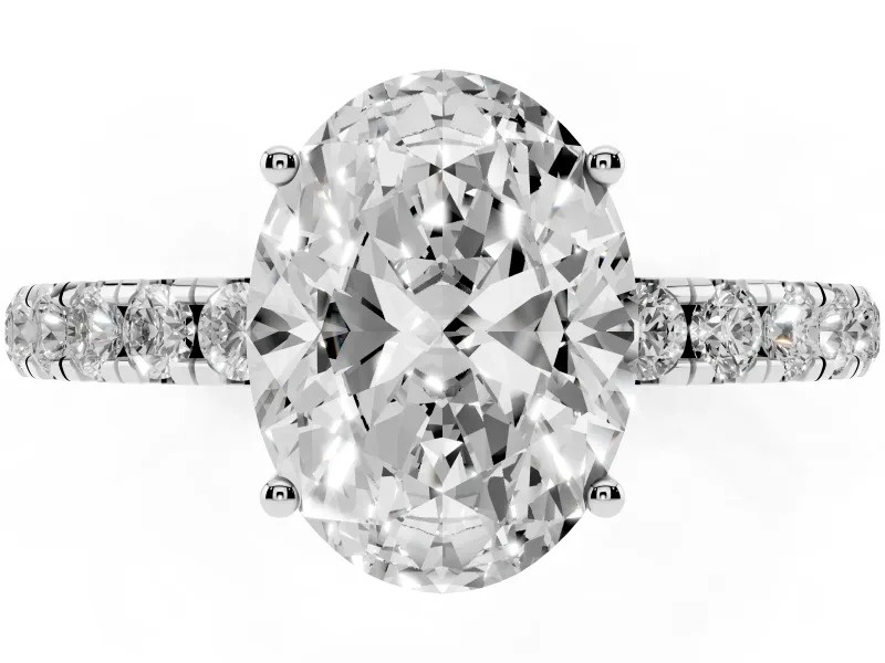 Oval Cut Diamond Pavé Solitaire Engagement Ring Set in Silver with Prong Setting