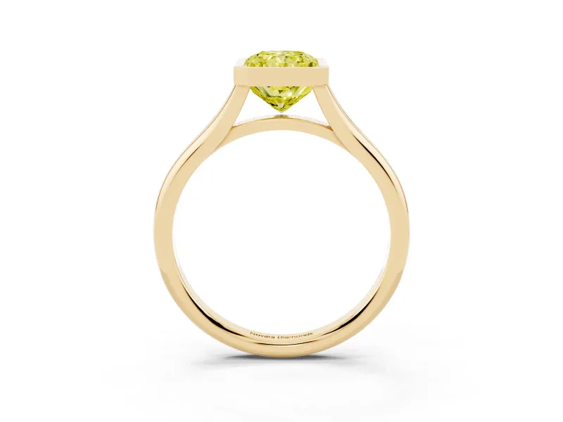 Fancy Yellow Bezel Set Radiant Cut Diamond Solitaire Ring Set in Yellow gold with Tapered Band