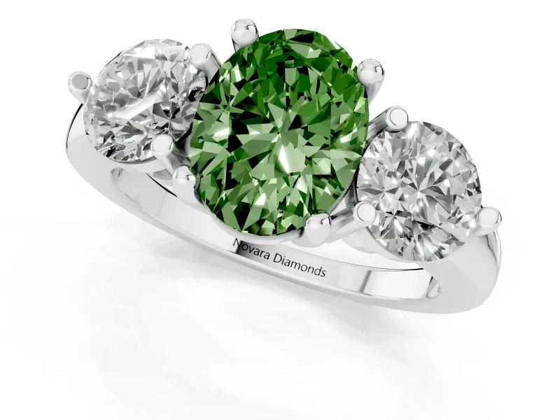 Fancy Green Oval Cut Diamond Three-Stone Ring Set in Platinum with Prong Setting and Classic Band